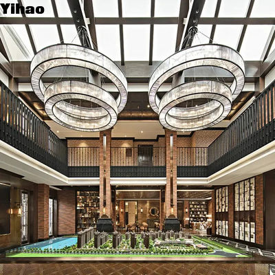 Lámparas personalizadas Hotel Lobby Lustrero de cadena Lustrero moderno con fuente de luz E12