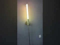 lámpara de pared hecha a medida de latón